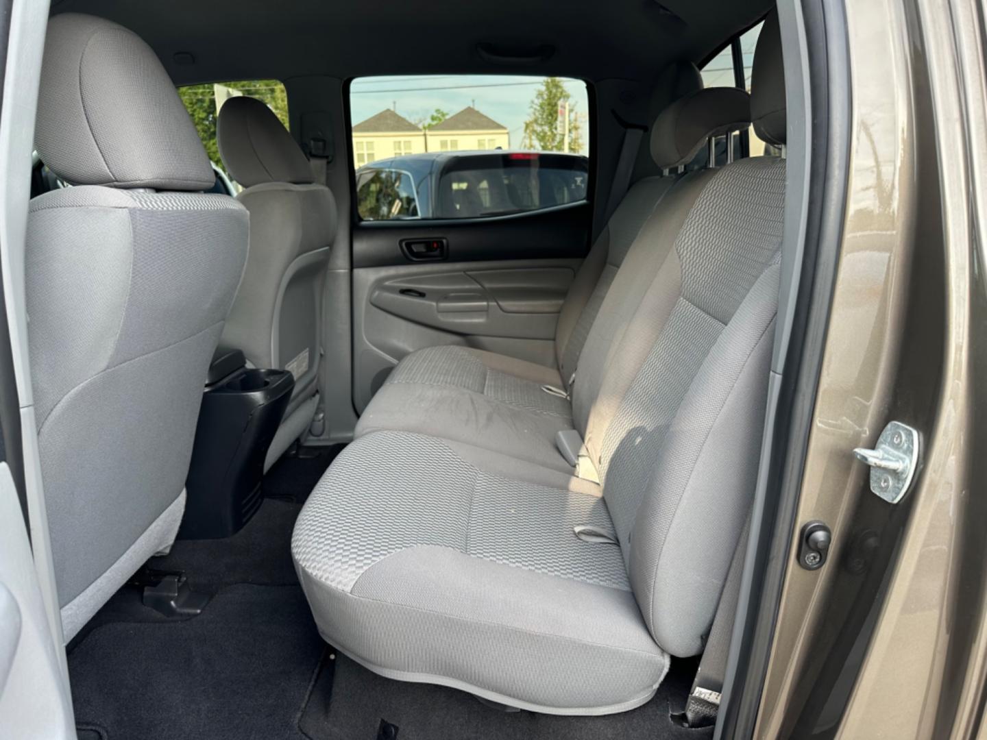 2012 Brown /Silver Toyota Tacoma SR5 (5TFJU4GN5CX) with an 4.0L engine, Automatic transmission, located at 1501 West 15th St., Houston, 77008, (713) 869-2925, 29.797941, -95.411789 - Photo#7